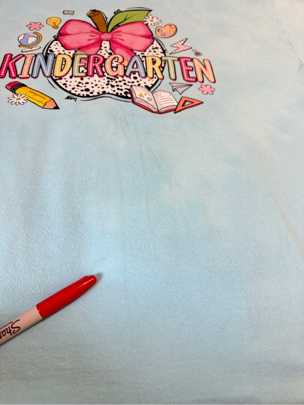 Gildan Light Blue Short Sleeve Kindergarten teacher Graphic Tee with Pink Bow - Picture 8 of 8